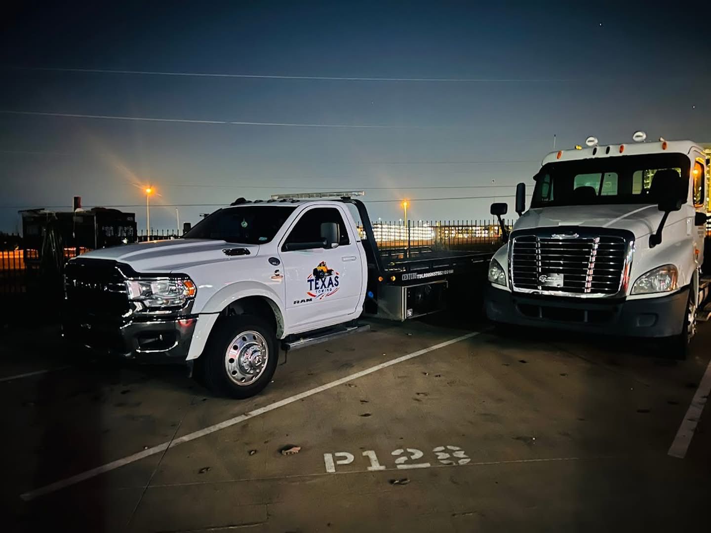 Texas Towing tow truck at night