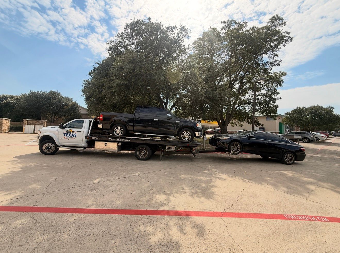 Texas Towing rollback truck towing vehicles
